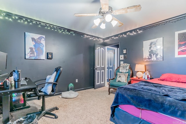 bedroom featuring a ceiling fan, carpet, and baseboards