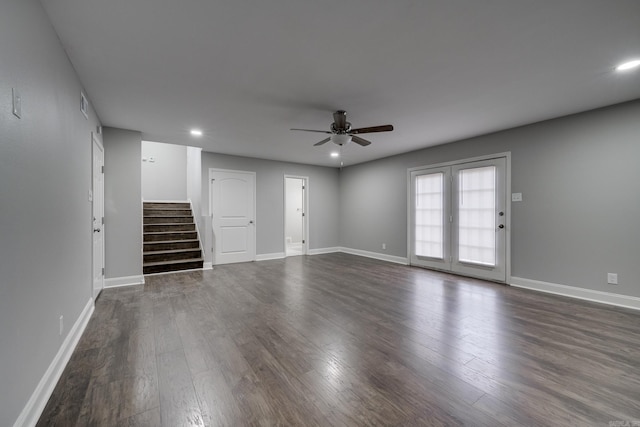 unfurnished living room with dark wood-style floors, recessed lighting, stairway, ceiling fan, and baseboards