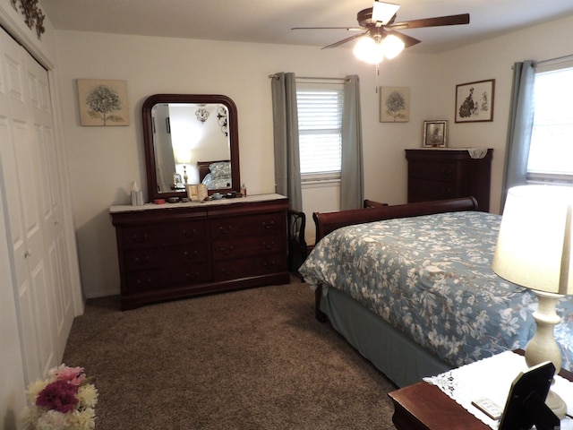 bedroom featuring a closet, carpet, and a ceiling fan