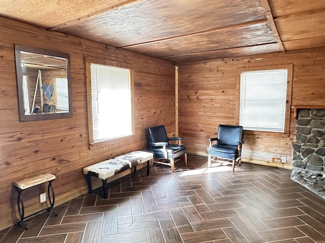 unfurnished room with wooden walls