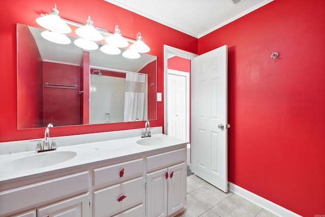 full bathroom featuring double vanity, baseboards, ornamental molding, tile patterned floors, and a sink