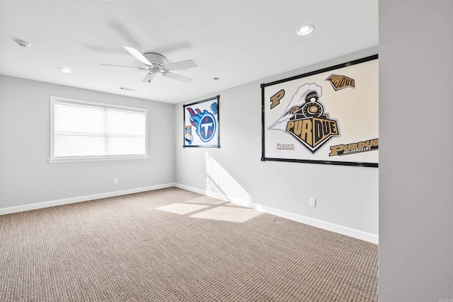 empty room featuring a ceiling fan, carpet, baseboards, and recessed lighting