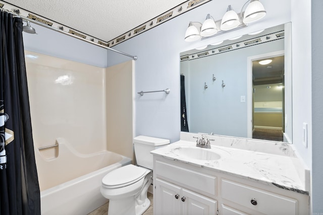 bathroom with shower / bath combination with curtain, a textured ceiling, toilet, and vanity