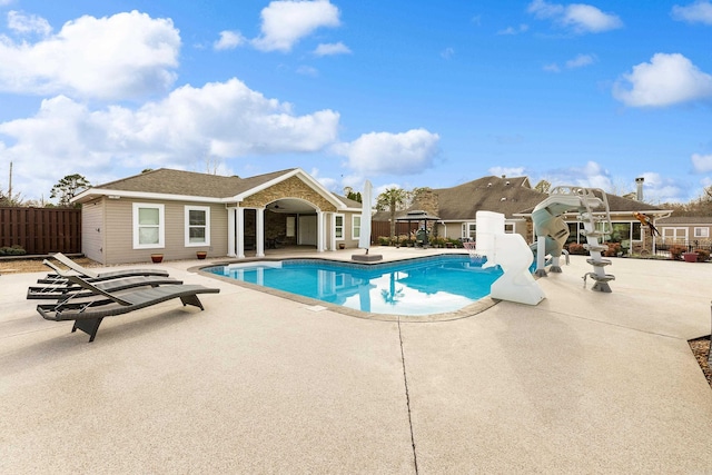 view of pool with a patio, fence, and a fenced in pool