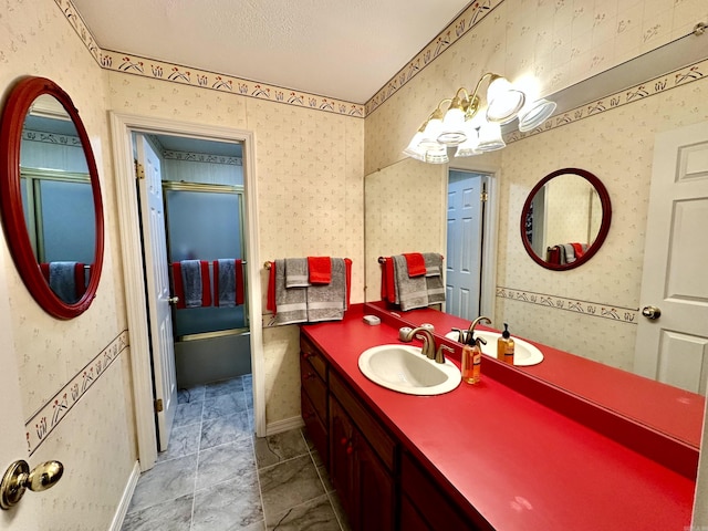 312 State St, Dardanelle, AR 72834 - bathroom featuring wallpapered walls, baseboards, a shower with door, a textured ceiling, and vanity