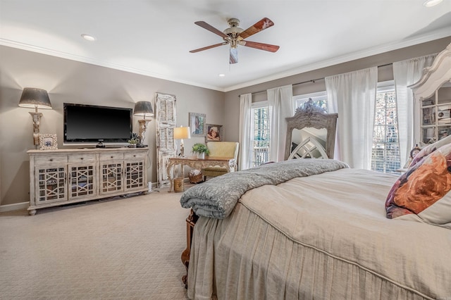 bedroom featuring recessed lighting, carpet flooring, a ceiling fan, baseboards, and ornamental molding