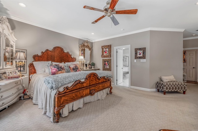 carpeted bedroom featuring ceiling fan, recessed lighting, baseboards, ornamental molding, and ensuite bath