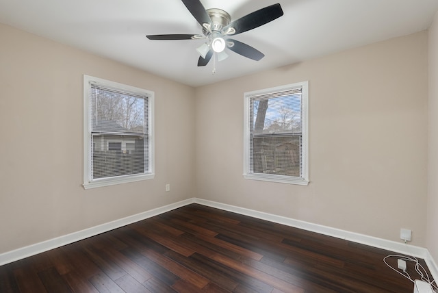 3215 Katherine St, Little Rock, AR 72204 - spare room featuring a ceiling fan, baseboards, and dark wood-style flooring