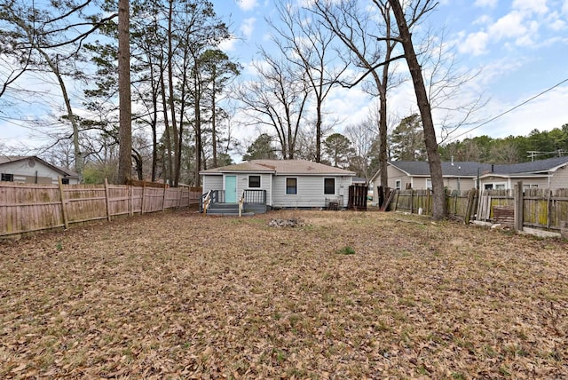 3215 Katherine St, Little Rock, AR 72204 - back of house with a fenced backyard