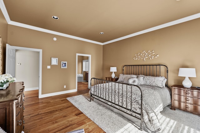 bedroom with baseboards, ornamental molding, wood finished floors, and recessed lighting