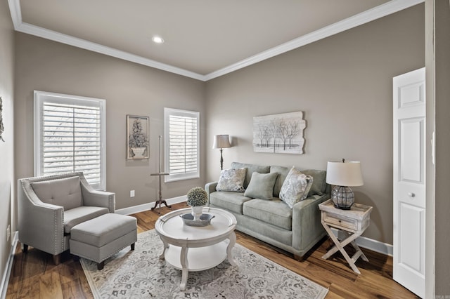 living room with ornamental molding, recessed lighting, baseboards, and wood finished floors