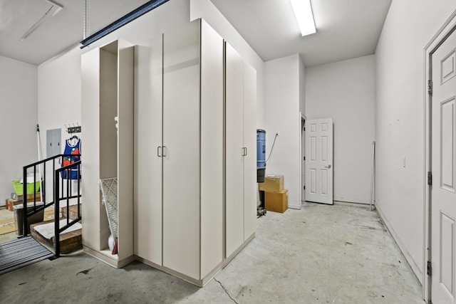 corridor with concrete flooring