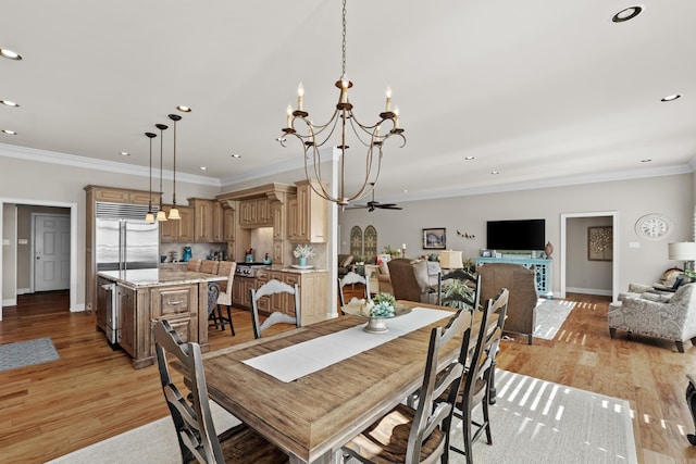 dining room featuring light wood-style flooring, ornamental molding, baseboards, and recessed lighting