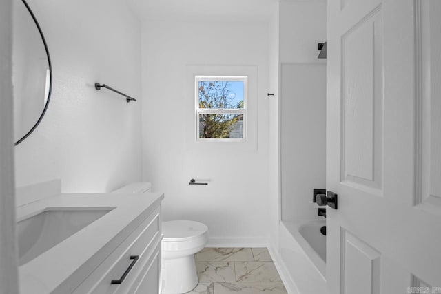 full bath featuring marble finish floor, baseboards, vanity, and toilet