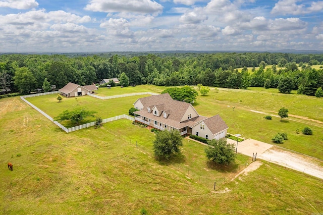 aerial view featuring a rural view and a view of trees