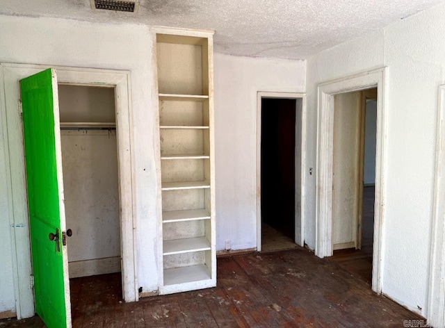 closet featuring visible vents