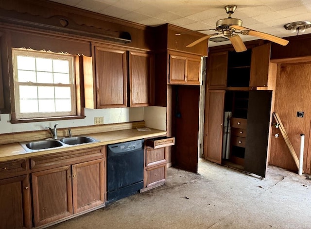 kitchen with dishwasher, ceiling fan, a sink, and brown cabinets