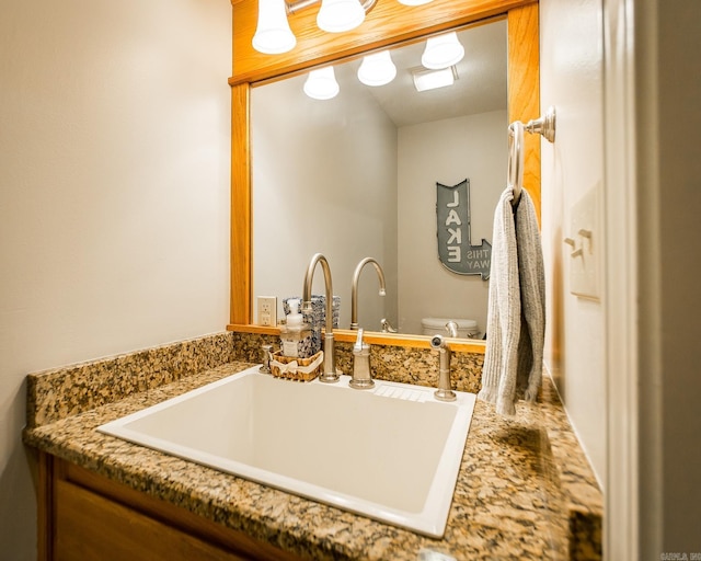 bathroom featuring a sink and toilet