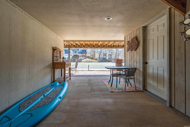 view of patio featuring a balcony