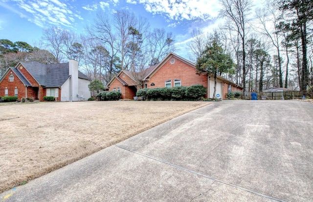 view of front facade featuring brick siding