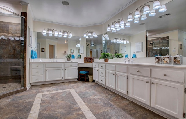 full bathroom featuring a sink, two vanities, visible vents, ornamental molding, and a stall shower