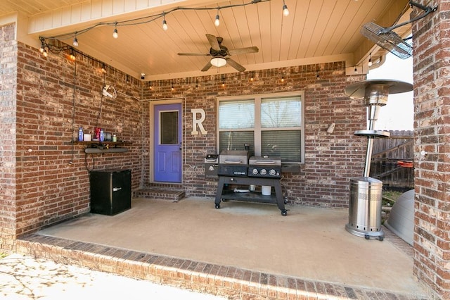 view of patio / terrace with a grill and a ceiling fan