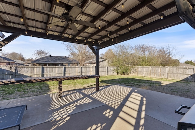 view of patio featuring a fenced backyard and ceiling fan