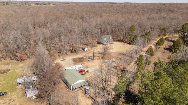 bird's eye view featuring a view of trees