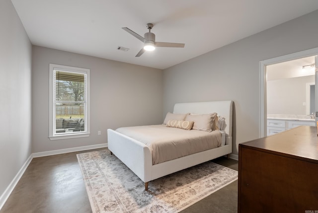 bedroom featuring baseboards, concrete floors, visible vents, and a ceiling fan