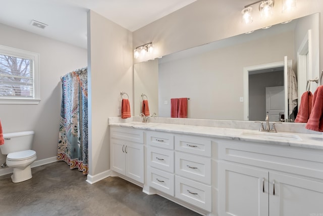 full bath with double vanity, visible vents, toilet, a sink, and baseboards