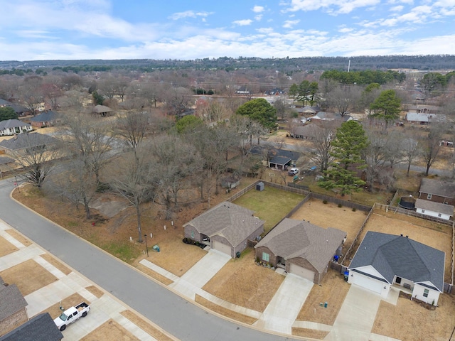 birds eye view of property with a residential view