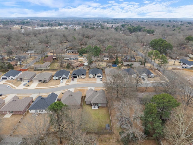 birds eye view of property with a residential view