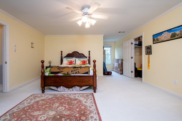 bedroom with ornamental molding, carpet floors, and baseboards