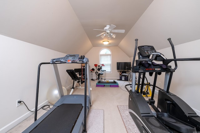 workout area with vaulted ceiling, ceiling fan, carpet flooring, and baseboards