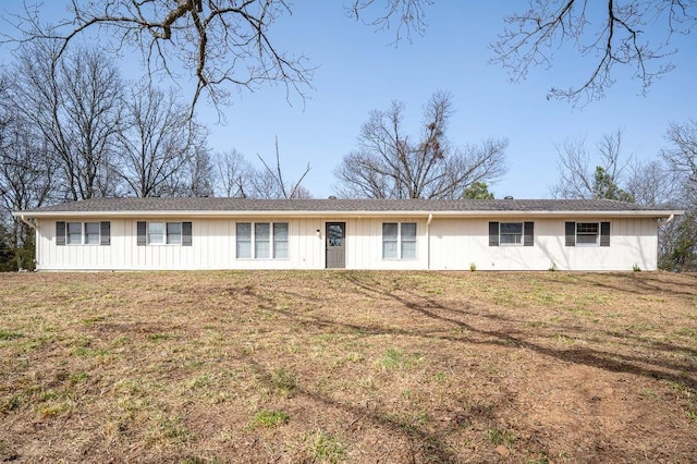 ranch-style house with a front yard