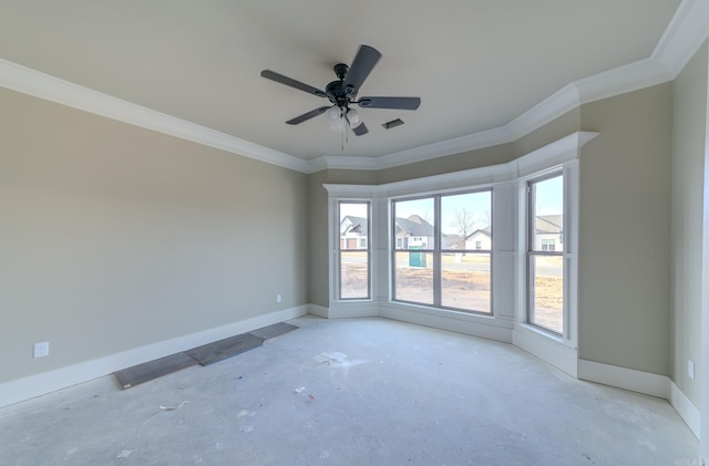 spare room featuring crown molding, unfinished concrete flooring, visible vents, and baseboards