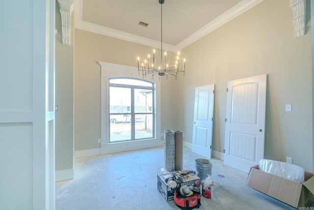 dining room featuring baseboards, visible vents, a towering ceiling, crown molding, and a notable chandelier