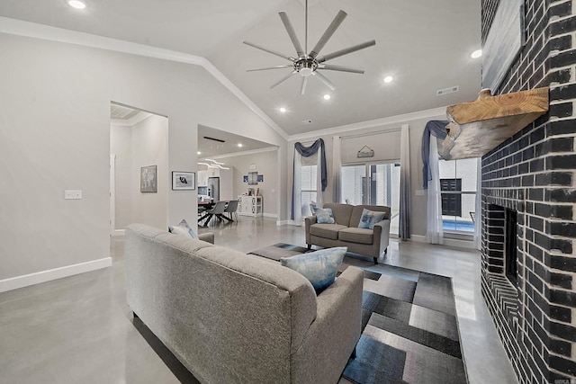 living area with crown molding, lofted ceiling, a brick fireplace, ceiling fan, and baseboards