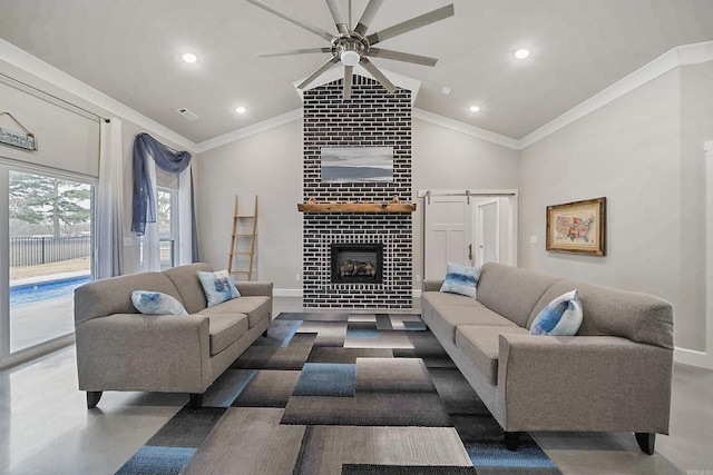 living area featuring ornamental molding, a tiled fireplace, a ceiling fan, and baseboards