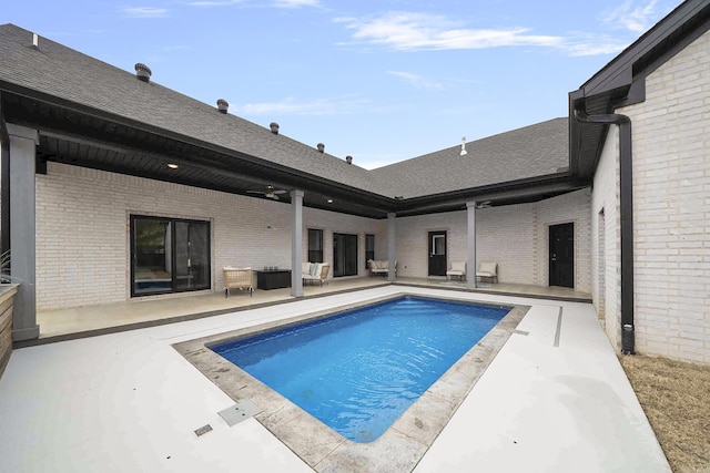 pool with a patio area