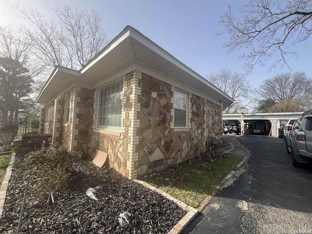 view of home's exterior featuring crawl space