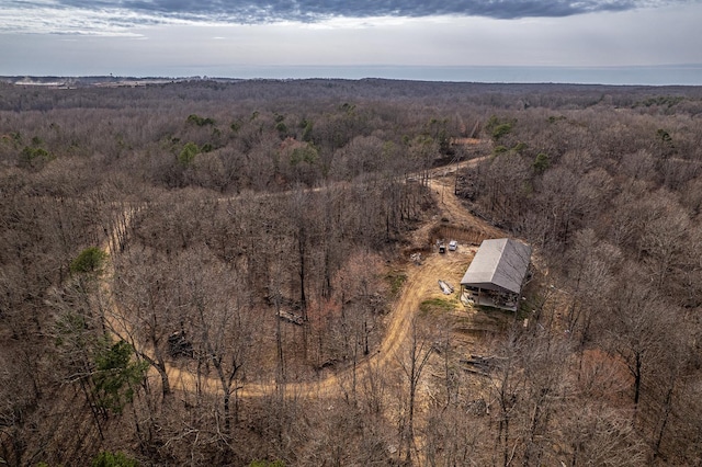 bird's eye view featuring a view of trees