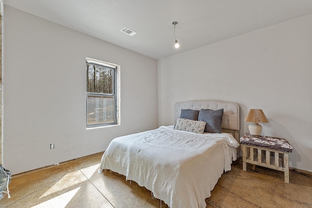 bedroom featuring visible vents