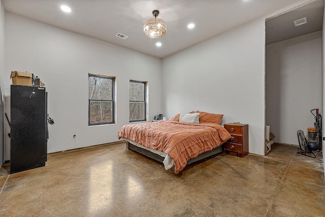 bedroom featuring recessed lighting, visible vents, and concrete floors