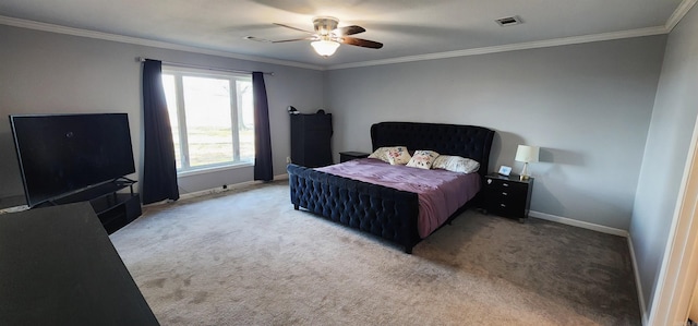 bedroom with ceiling fan, carpet floors, visible vents, baseboards, and ornamental molding