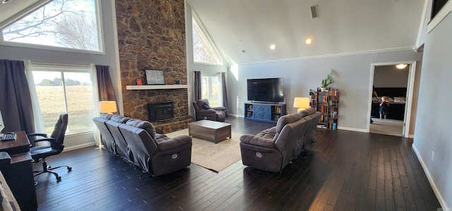 living area featuring dark wood-style floors, high vaulted ceiling, visible vents, and baseboards