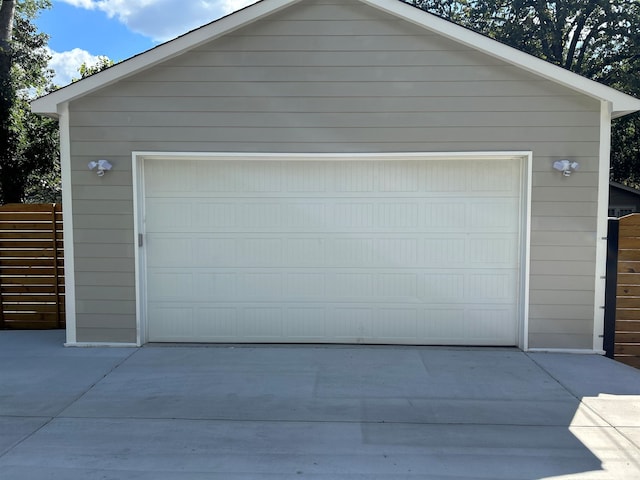 detached garage with fence