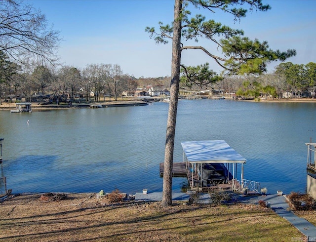 view of dock featuring a water view and boat lift