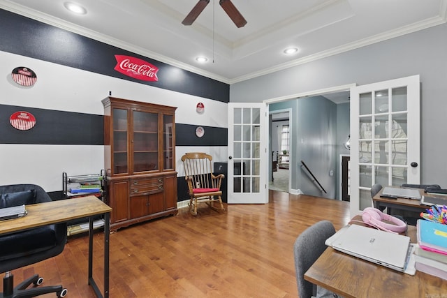 office with ornamental molding, french doors, and a raised ceiling