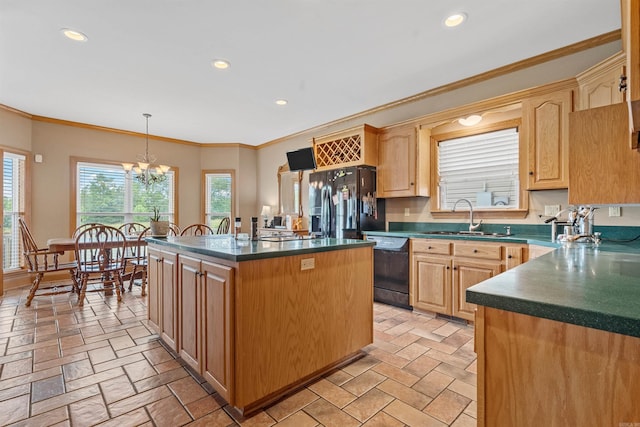 kitchen with black appliances, recessed lighting, dark countertops, and a sink